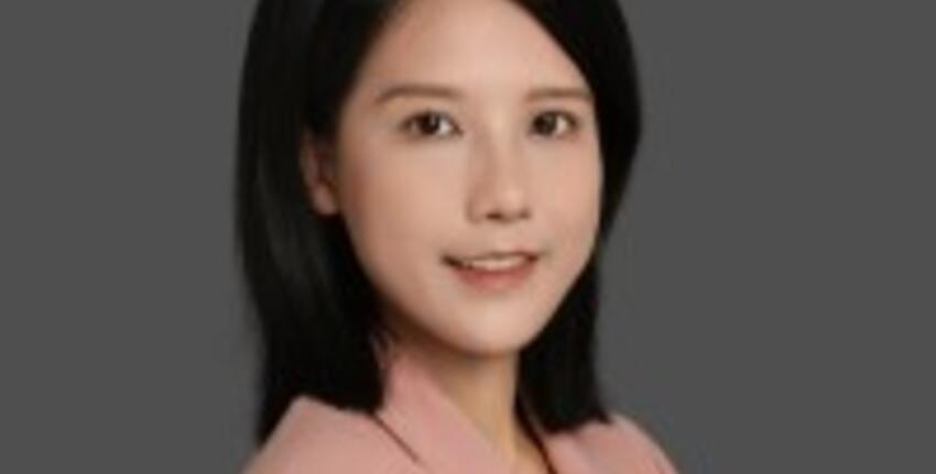 An image of a smiing woman (Dr Song)